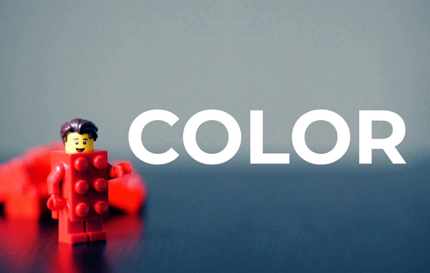 color-lego A friendly bright red LEGO man saying "Color!"