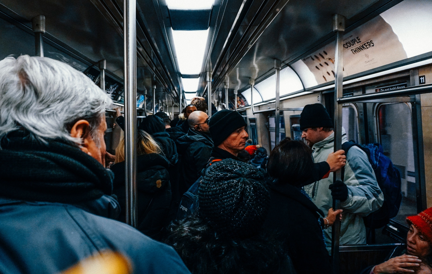 margins-subway An image of a bunch of people crammed into a subway car